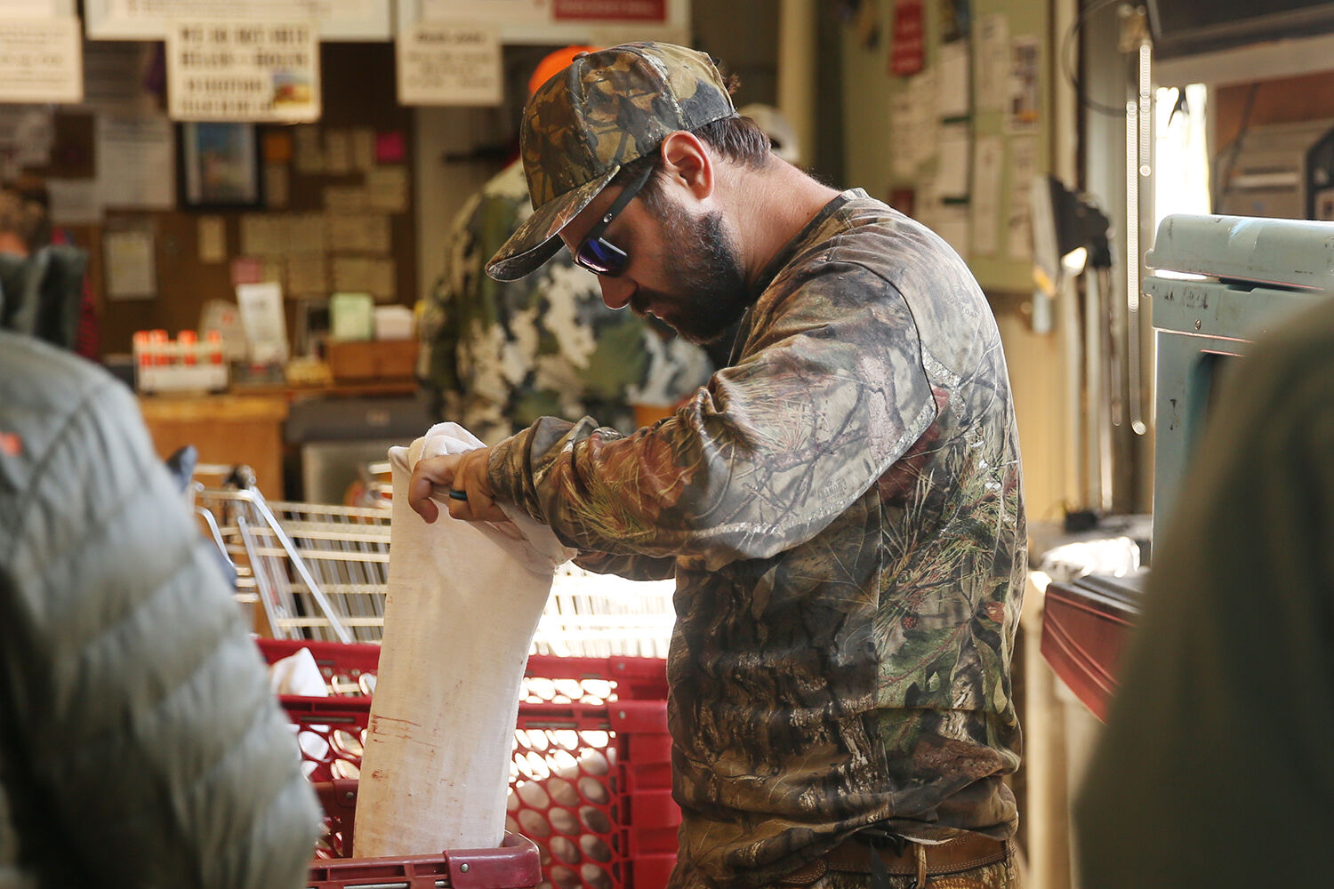 Matthew Wanner searches for his hunting license